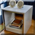 F03. White laquered square end table. 
